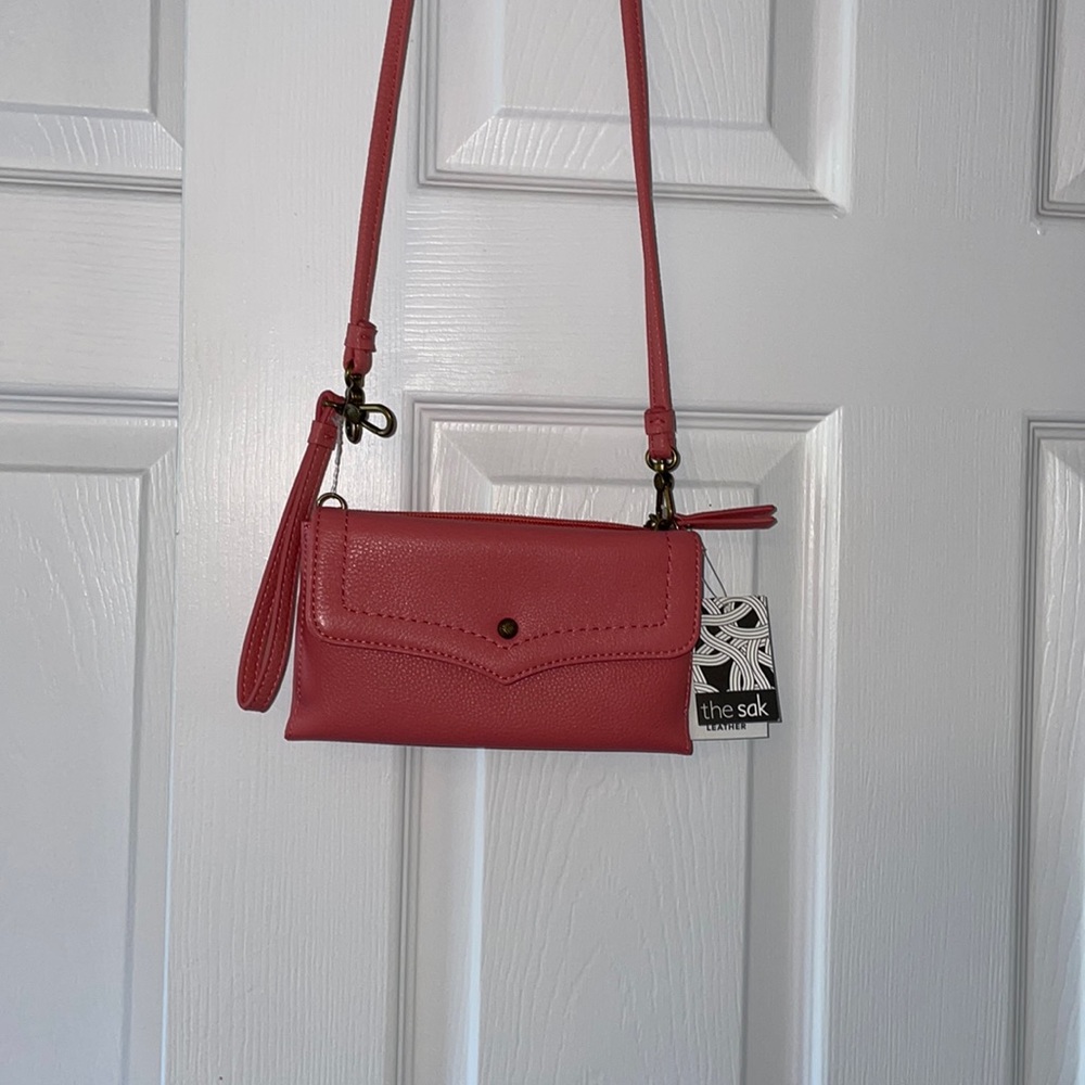 Brand new the sack purse/ wristlet